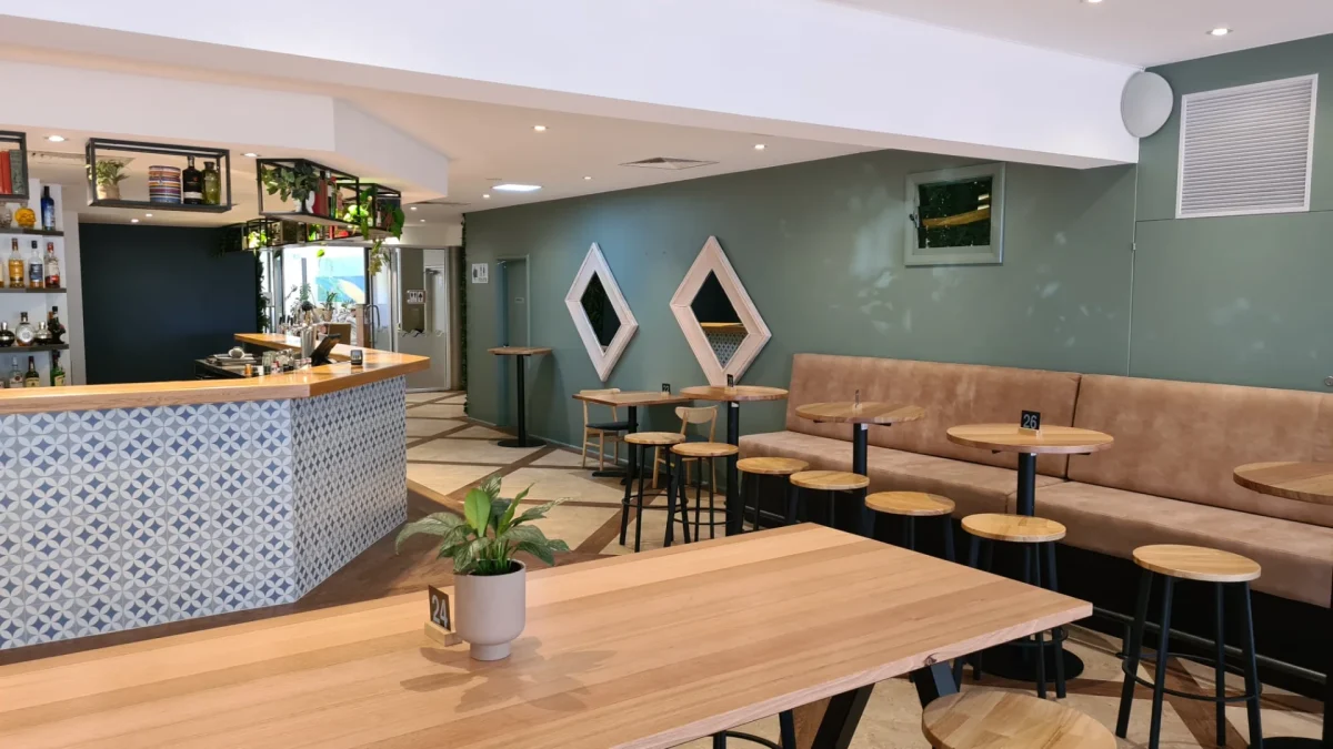 Maverick Barstools and Shaun Dry Bars by Robinson Group at Tonic by the Bay, with a Janelle Bar Table and Tasmanian Oak tops adding natural texture to the modern bar space.